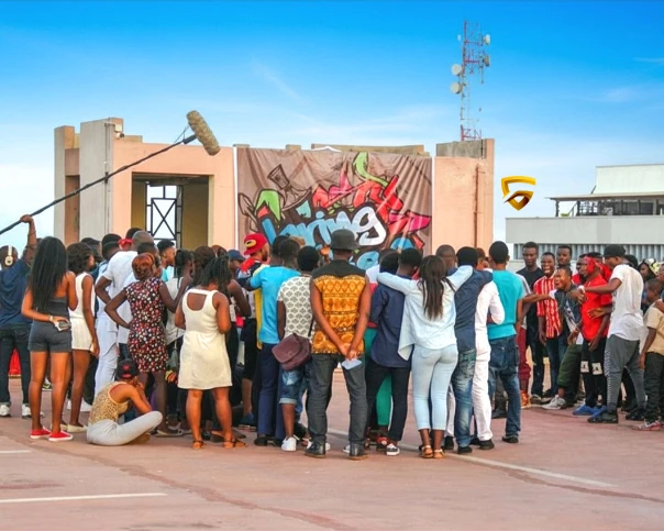 Background actors on a busy film set